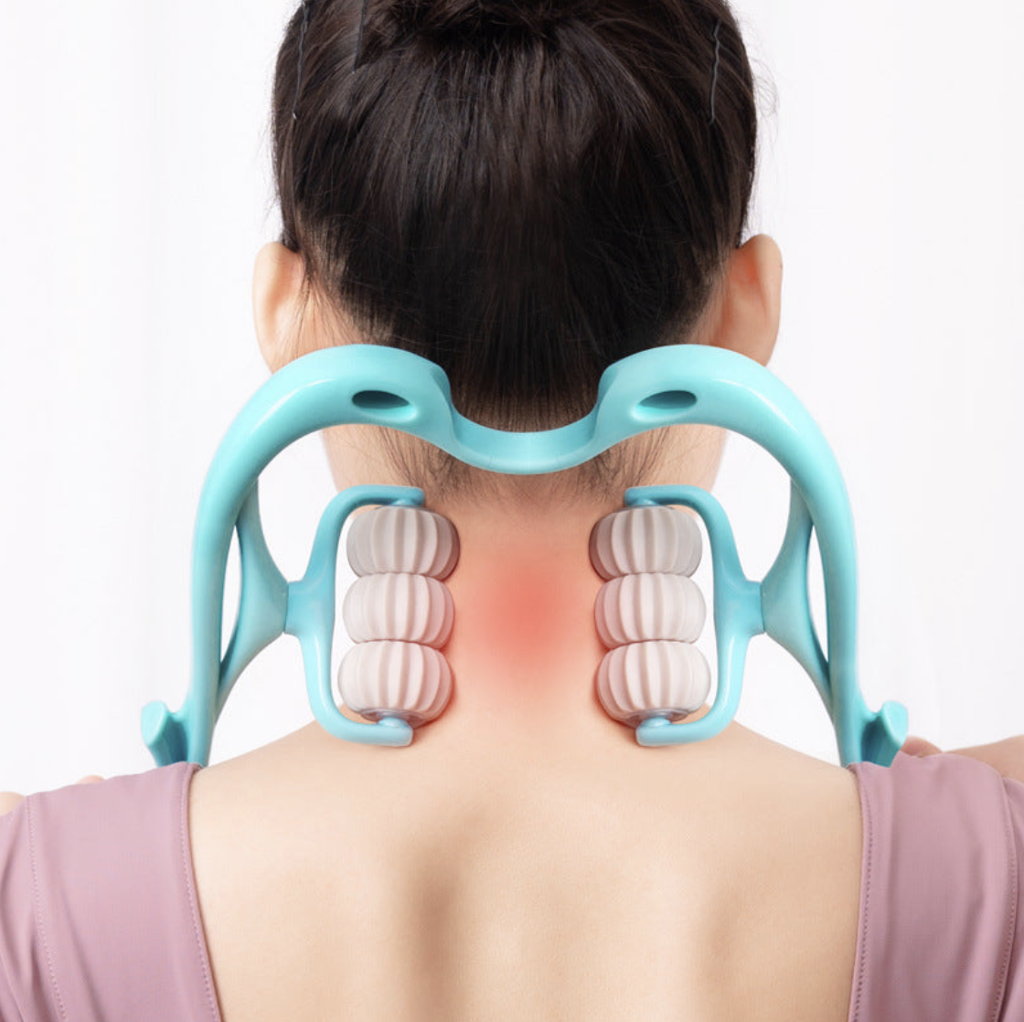 A woman using the NODE Swan 6-Roller massager on her neck and shoulders